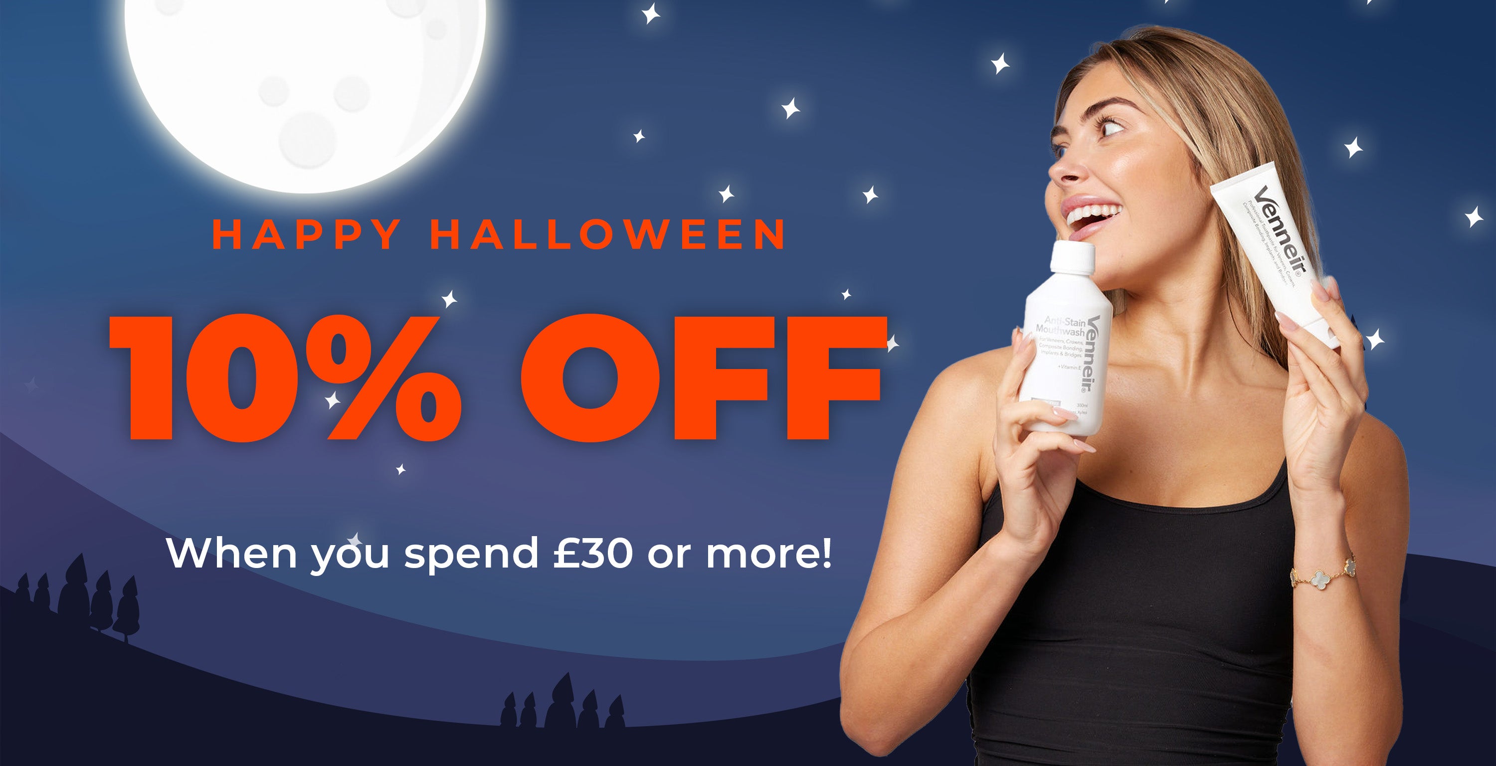 10% off when spend over £30 woman holding venneir toothpaste and mouthwash with halloween background
