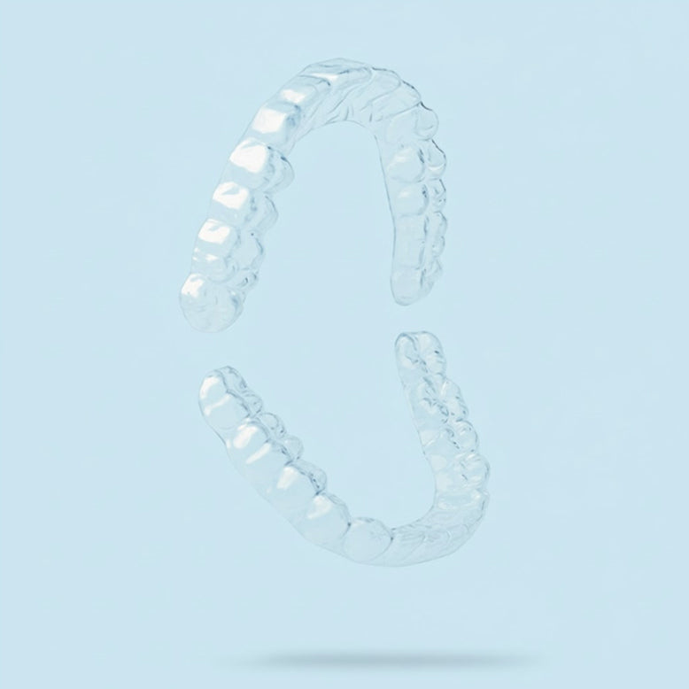 Clear upper and lower retainers on blue background