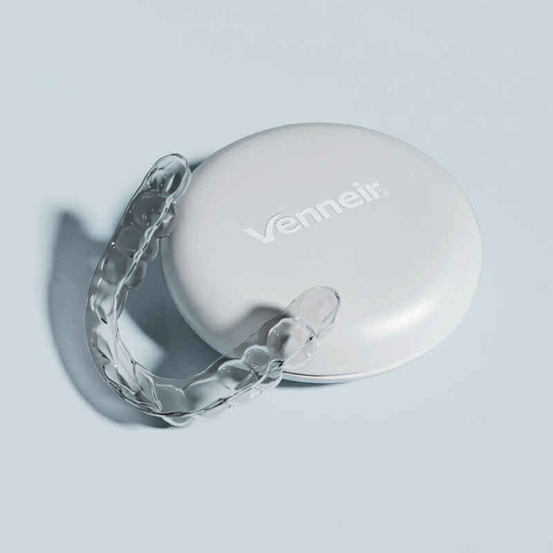 Clear upper retainer with protective storage case on light blue background