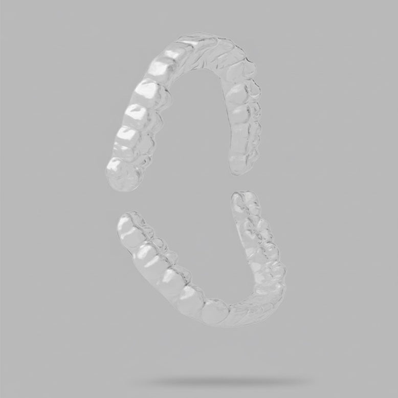 Clear upper and lower retainers on grey background