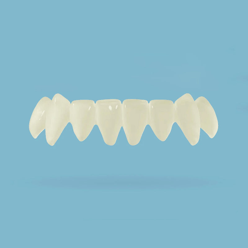 Bottom snap on veneers on a light blue background