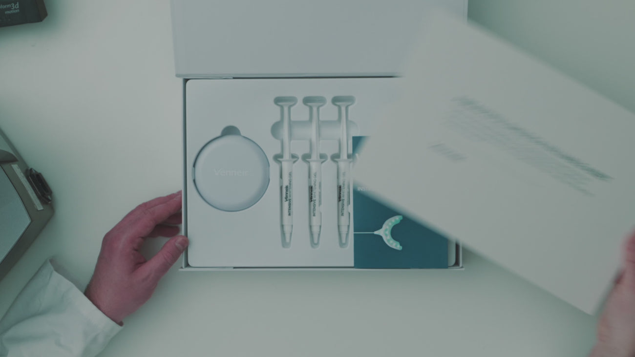Video of unboxing whitening kit with custom-made bleaching trays