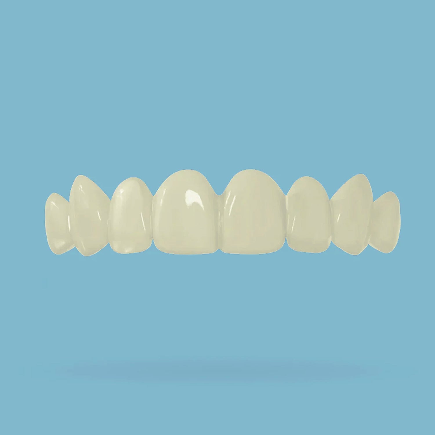 Top teeth snap on veneer on a light blue background