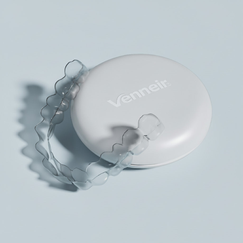 Clear upper retainer with protective storage case on light blue background